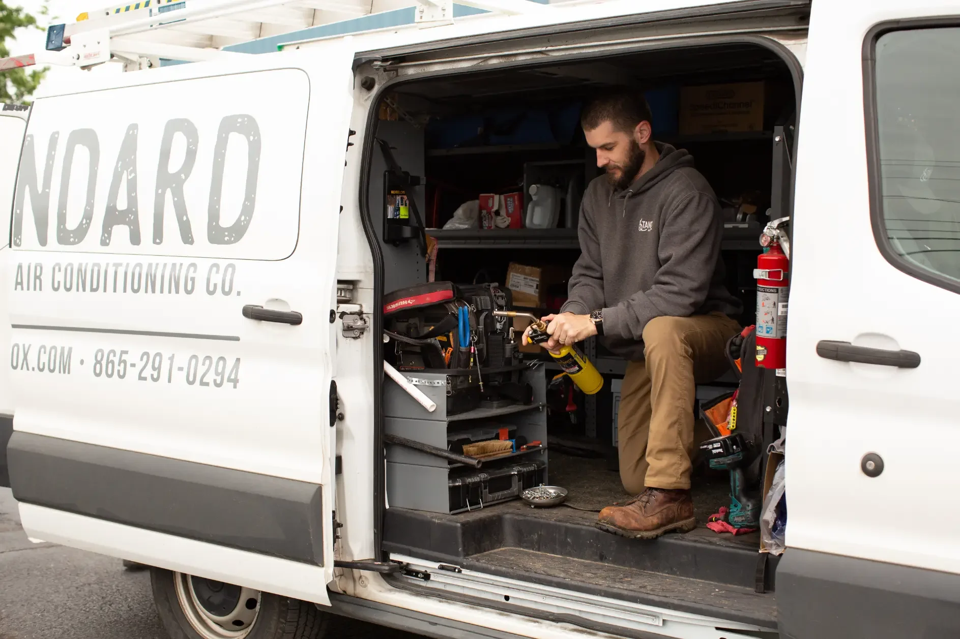 Standard AC technician in truck